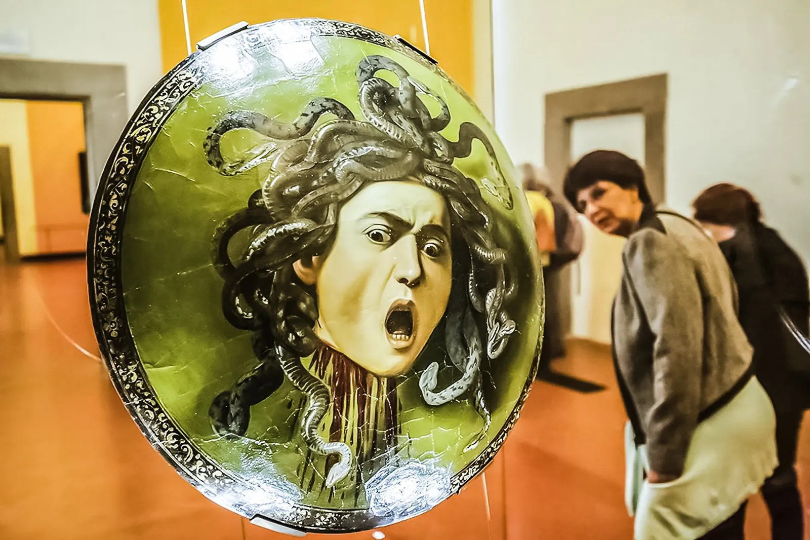Caravaggio's Medusa shield in its glass case