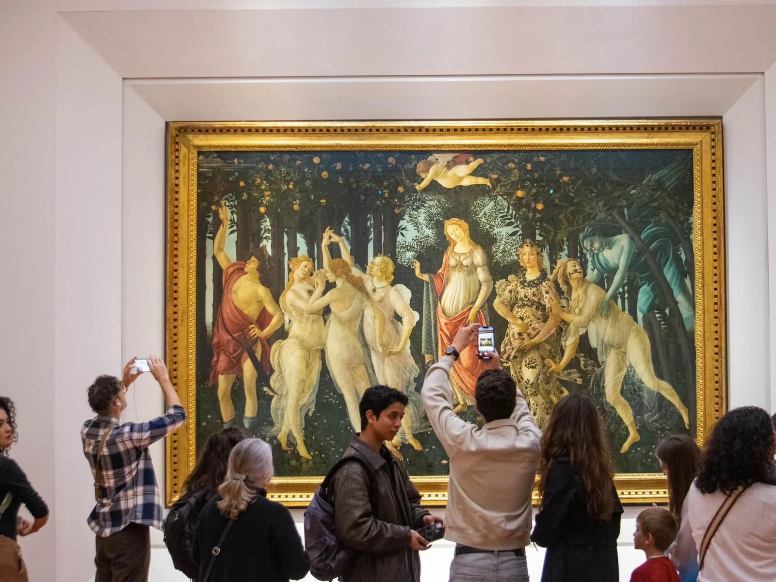 Visitors photographing Botticelli's Primavera