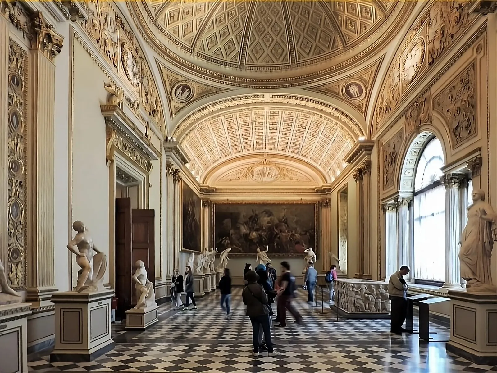 The Niobe Room with its checkerboard floor and gilded ceiling