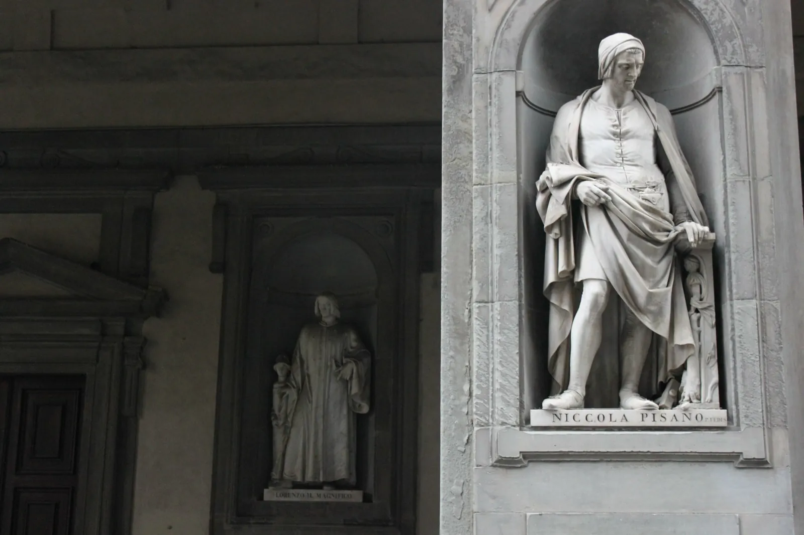 Statues of Tuscan artists in the niches of the Uffizi loggia