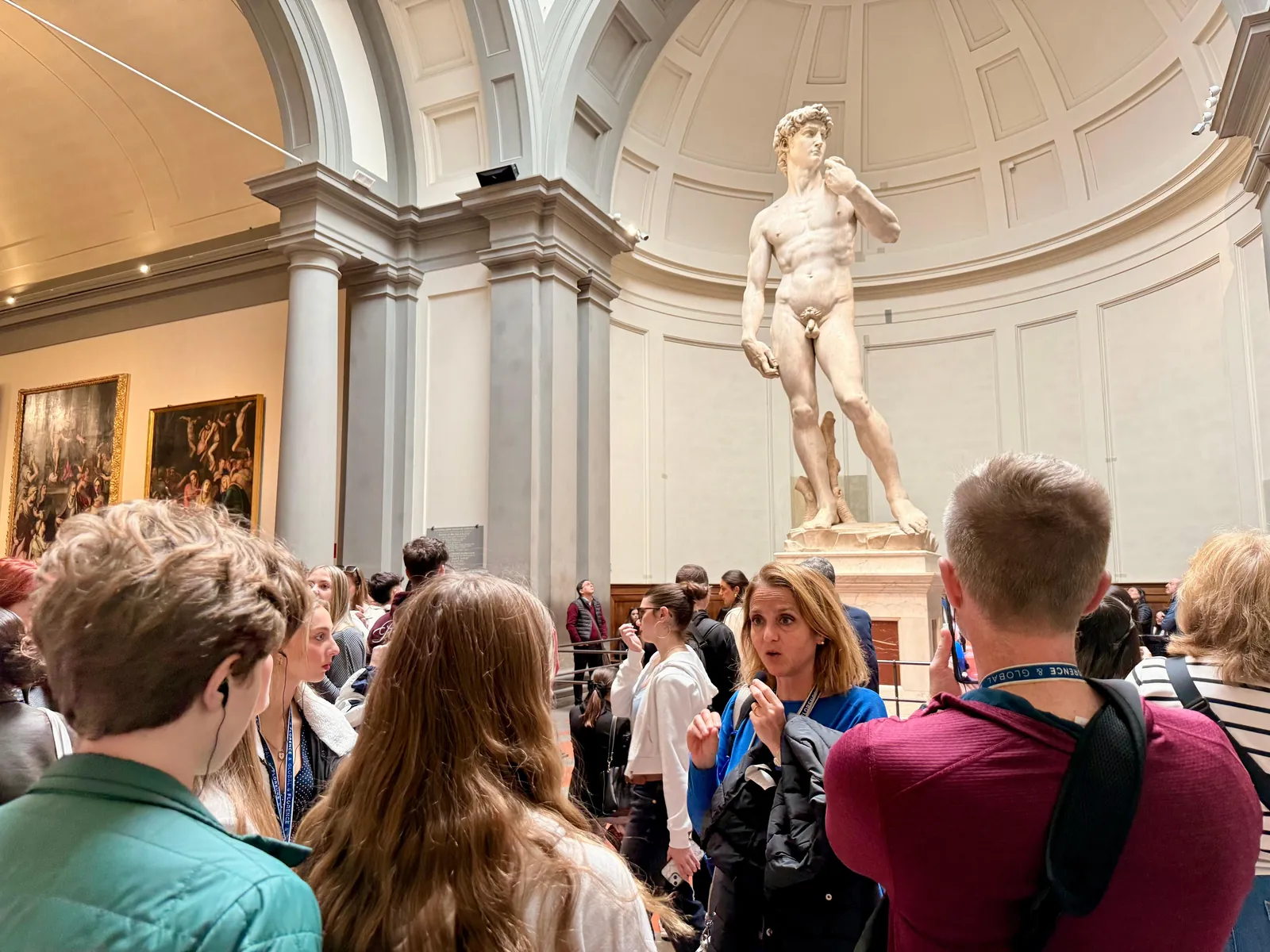 Visitors gathered around Michelangelo's David